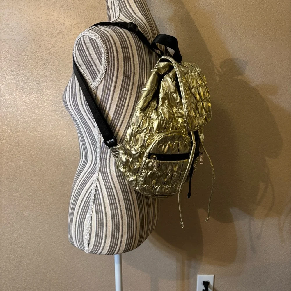 NWT Madden Girl Backpack Metallic Gold Quilted Drawstring Shiny Black Zip Straps